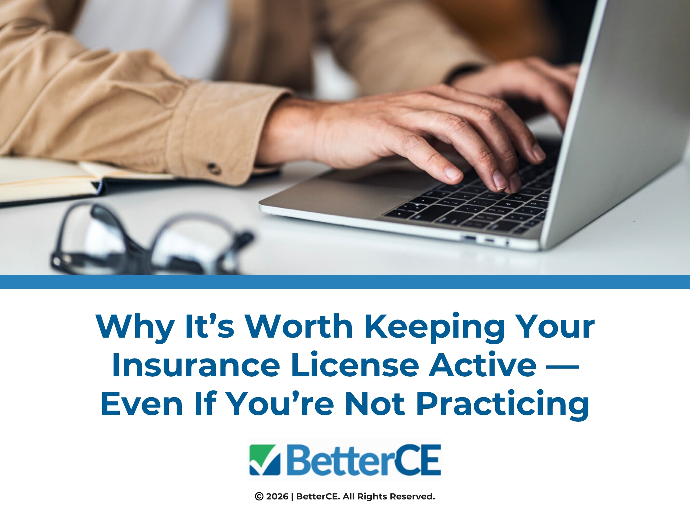 Person's hands typing on a laptop at a desk. Article title.